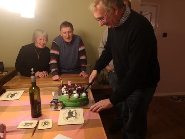 Gwynne cutting birthday cake