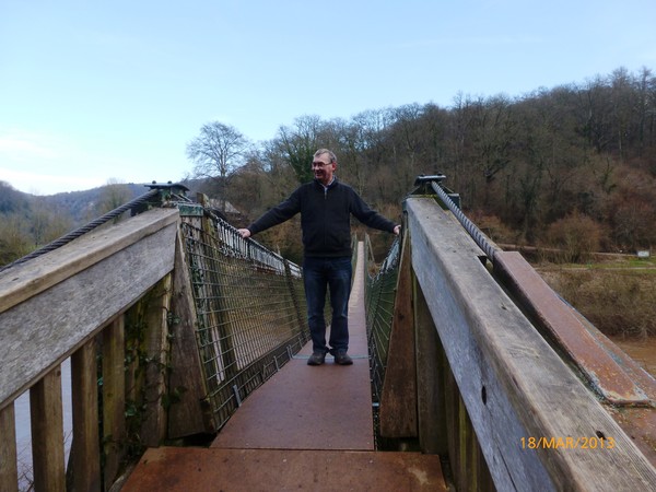 Gwynne crossing a foot bridge