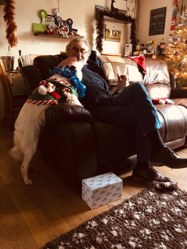 Gwynne on a sofa with a dog